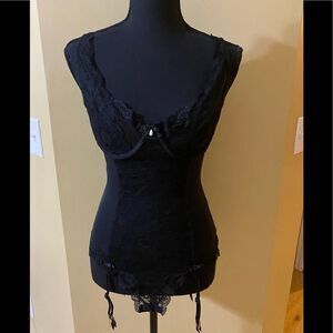 Victoria’s Secret size 34D NWOT black lace corset with adjustable straps.